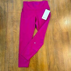 Lululemon size 8 wonder train tights 25” with pockets